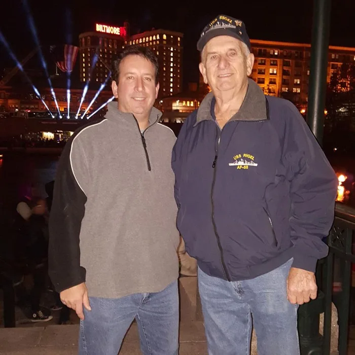 Raymond D. Melanson with his father, a Navy veteran, at a reunion event